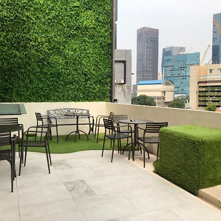 Eightin Hotel Sudirman Джакарта Экстерьер фото